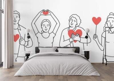 Smiling people holding hearts. Wall mural