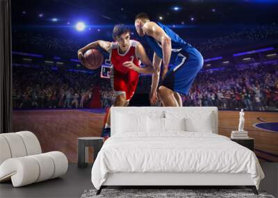 Basketball player n action. around Arena with blue light spot Wall mural