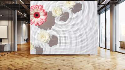 Sunny summer cosmetic background with flowers. Wall mural