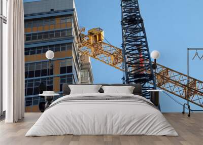 the crane fell to a high-rise building Wall mural