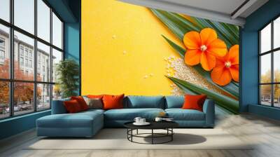 Two vibrant orange flowers with green leaves and rice grains arranged on a yellow background, symbolizing a traditional offering. Wall mural