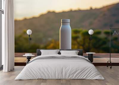 White plastic bottle mockup. Mock up rests on a wooden table with a mountain backdrop. Blank reusable flask overlooking a breathtaking lakeside vista Wall mural