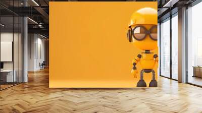 Yellow cartoon robot with goggles and hard hat on orange background. Wall mural