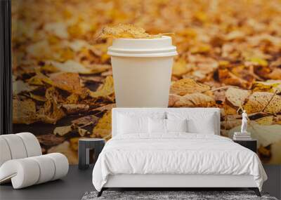 Eco zero waste white paper cup copy space mockup. Fall leaves and cup of tea coffee to go next to autumn nature. Unite with nature cottagecore Wall mural