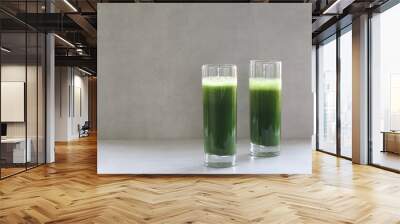 Green vegetable juice for a raw vegan diet. Fresh green from herbs and cabbage. Aojiru is a Japanese drink. Aojiru is a Japanese vegetable drink made from kale cabbage. Wall mural