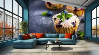 Blueberry muffins with powdered sugar and fresh berry Wall mural