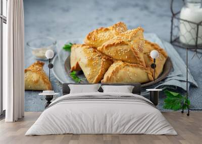 Fresh baked homemade pasties with meat and vegetables Wall mural