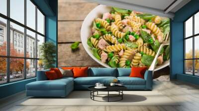 fusilli pasta with salmon, spinach and grean peas Wall mural