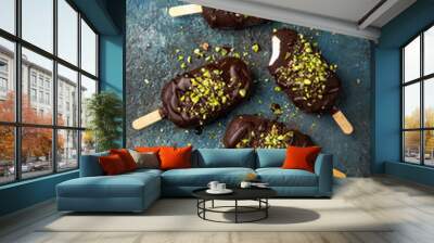 homemade vanilla ice cream with chocolate glaze and pistachios Wall mural