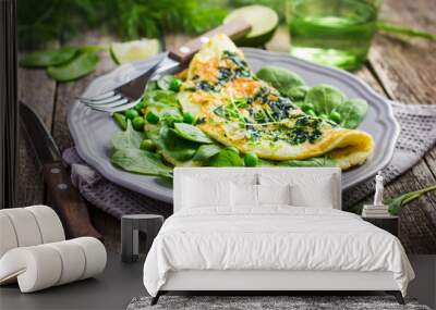 omelette with spinach and green peas Wall mural