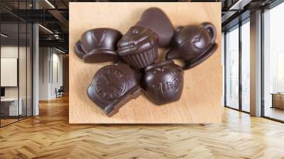 Homemade no sugar proper nutrition chocolate candies on a wooden background. Healthy food Wall mural