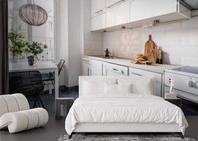 kitchen interior with bread on the countertop table by the window and grey tiled floor Wall mural