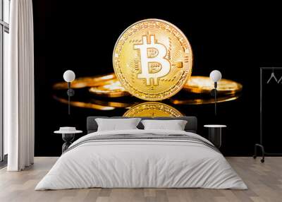 Bitcoin. Crypto currency Gold Bitcoin, BTC, Bit Coin. Macro shot of Bitcoin coins isolated on black background. Wall mural