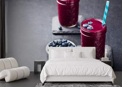 Asai berry smoothie with fresh blueberries. Grey background. Copy space. Wall mural