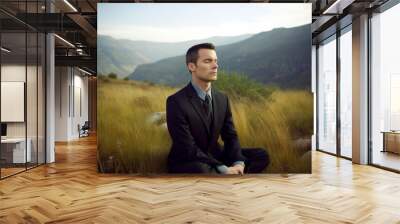 Group portrait photography of a man in his 20s practicing mindfulness sophrology relaxation & stress-reduction wearing a sleek suit against a mountain landscape background Wall mural