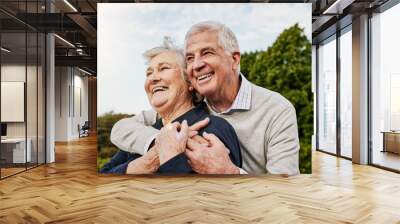 The retired years are the happy years. Shot of a happy senior couple spending time together outdoors. Wall mural