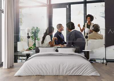 Whats the word Im looking for. Shot of businesspeople in an office. Wall mural