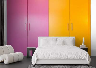 colorful pink and orange freshly painted wall and closet doors, doors are closed isolated on white Wall mural