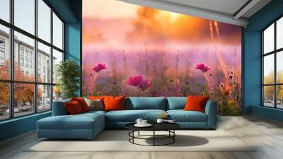 Summer flower meadow wildflower field pink with morning sunlight, Idyllic spring background with blossoming lilac bushes flowers and pink wildflowers on meadow. Pink morning clouds on blue sky over  Wall mural