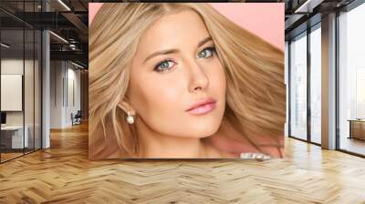 Beauty, makeup and hairstyle, beautiful blonde woman with glossy lipstick make up on pink background as bridal make-up look, fashion and glamour model face portrait for cosmetics, skincare and hair Wall mural