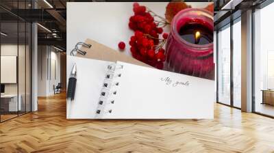 Notebook with candle and autumn leaves. Planning Wall mural