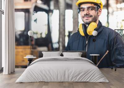 Industrial Engineers in Hard Hats.Work at the Heavy Industry Manufacturing Factory.industrial worker indoors in factory. man working in an industrial factory. Wall mural