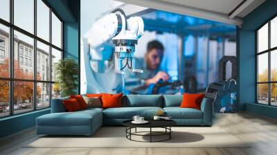 Male Engineers Maintenance Robot Arm at Lab. he are in a High Tech Research Laboratory with Modern Equipment. Technology and Innovation Concept.Professional. Wall mural