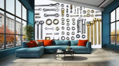 A collection of various metal tools and fasteners organized neatly. Wall mural