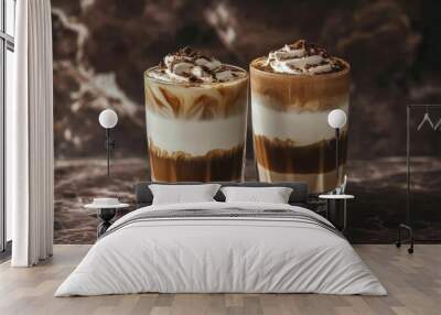 Two layered coffee drinks with whipped cream and chocolate on a marble surface. Wall mural