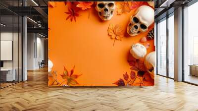 A creative arrangement showcases skulls and pumpkins surrounded by autumn leaves, inviting a festive Halloween vibe with ample space for design Wall mural