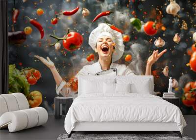 A female chef in a crisp uniform joyfully throws fresh ingredients into the air, surrounded by flying vegetables and a playful atmosphere in the kitchen Wall mural