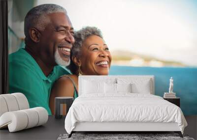 An elderly dark-skinned couple on the deck of a ship or liner against the backdrop of the sea. Happy and smiling people. Travel on a sea liner. Love and romance of older people. Wall mural