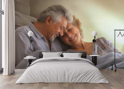 An elderly man and woman cuddling in bed, showcasing their enduring love and closeness Wall mural