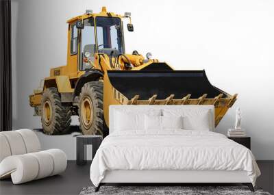 Heavy front loader or bulldozer on a white isolated background. construction machinery. Transportation and movement of bulk materials. Large bucket for earth, sand and gravel. Wall mural