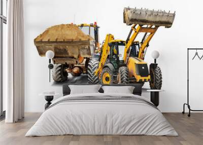 Two heavy front loaders or bulldozers on a white isolated background. Construction equipment and transport. Transportation and movement of bulk materials. Excavation. Element for design. Wall mural