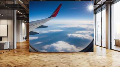 Photograph of the sky from the passenger window of an airplane Wall mural