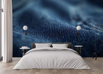 Close-up texture of dark blue denim fabric with visible weave details. Wall mural