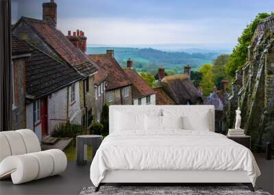 A row of cottages on a steep cobbled street at Gold Hill in Shaftesbury, Dorset, United Kingdom, England. Great Britain Wall mural