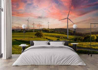 wind turbine in the field at sunset Wall mural