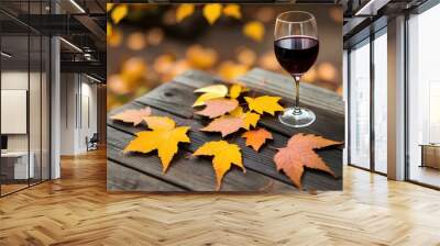 wine glass and autumn grape leaves Wall mural