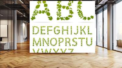 Vector alphabet letters made from leaves. Green floral font isolated on white background. Wall mural