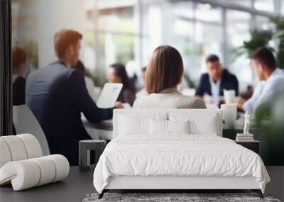 Blurred office interior space background with people working and meeting on table. Business concept.  Wall mural