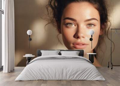 Closed up of beautiful young model face with nude make up on skin. Wall mural