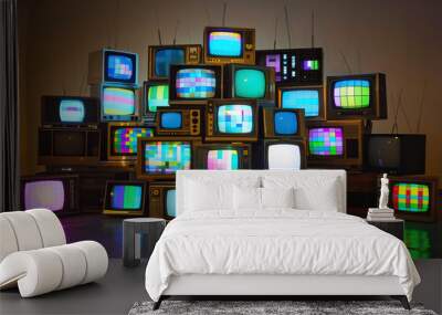 Stacked vintage televisions with vibrant screen displays, retro technology collection highlighting colorful static and old-fashioned TV sets in artistic composition. Wall mural