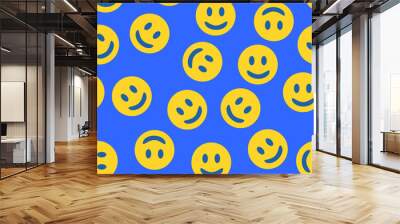 Retro yellow happy smile pattern on blue background. Wall mural