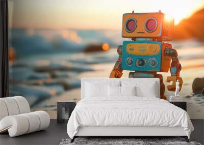 A cute colorful toy robot standing on the beach Wall mural