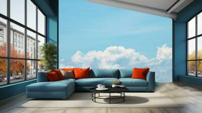 Blue sky background with clouds Wall mural