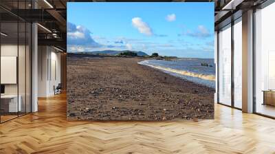 The deserted stony beach at Blue Anchor in Somerset, England Wall mural