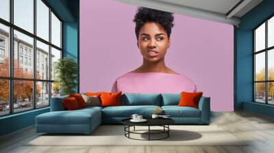 I hate you! Depressed stressful African American female clenched teeth, feels anger because of much work and duties about house, fed up with everything, has quarrel with enemy, poses indoor Wall mural