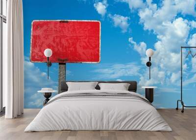 blank red road sign blue sky white clouds in background Wall mural